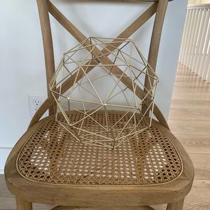 Gold geometric decorative sphere